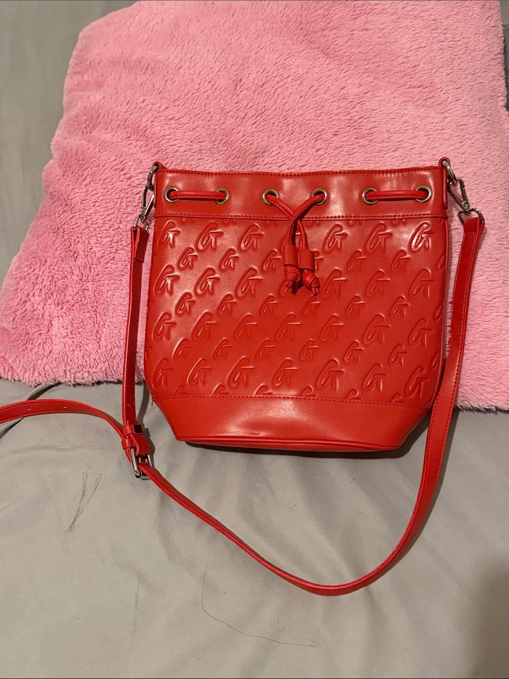 Red Embossed Bucket Crossbody Bag with Drawstring